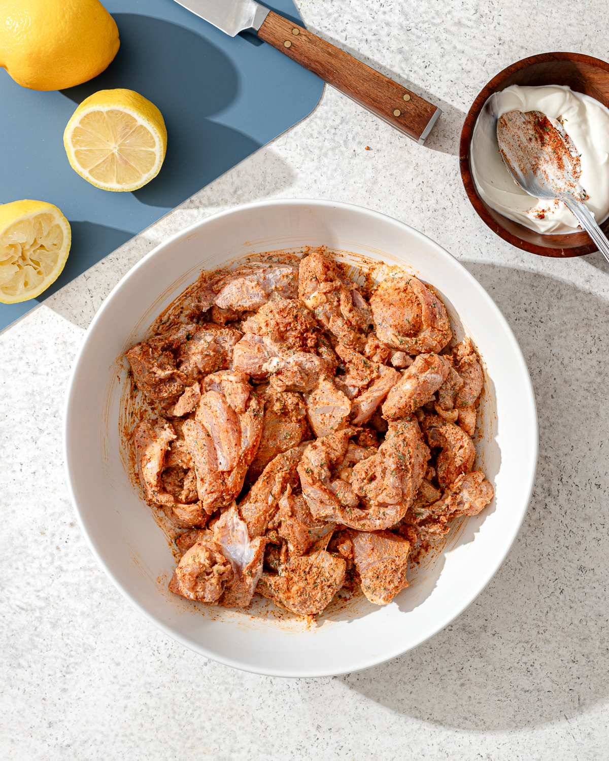 Chicken in a bowl for halal cart chicken recipe.