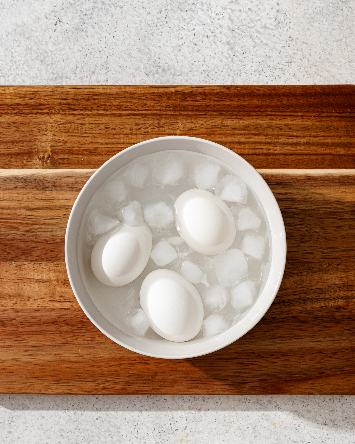 Eggs in an ice bath for how to make jammy eggs.