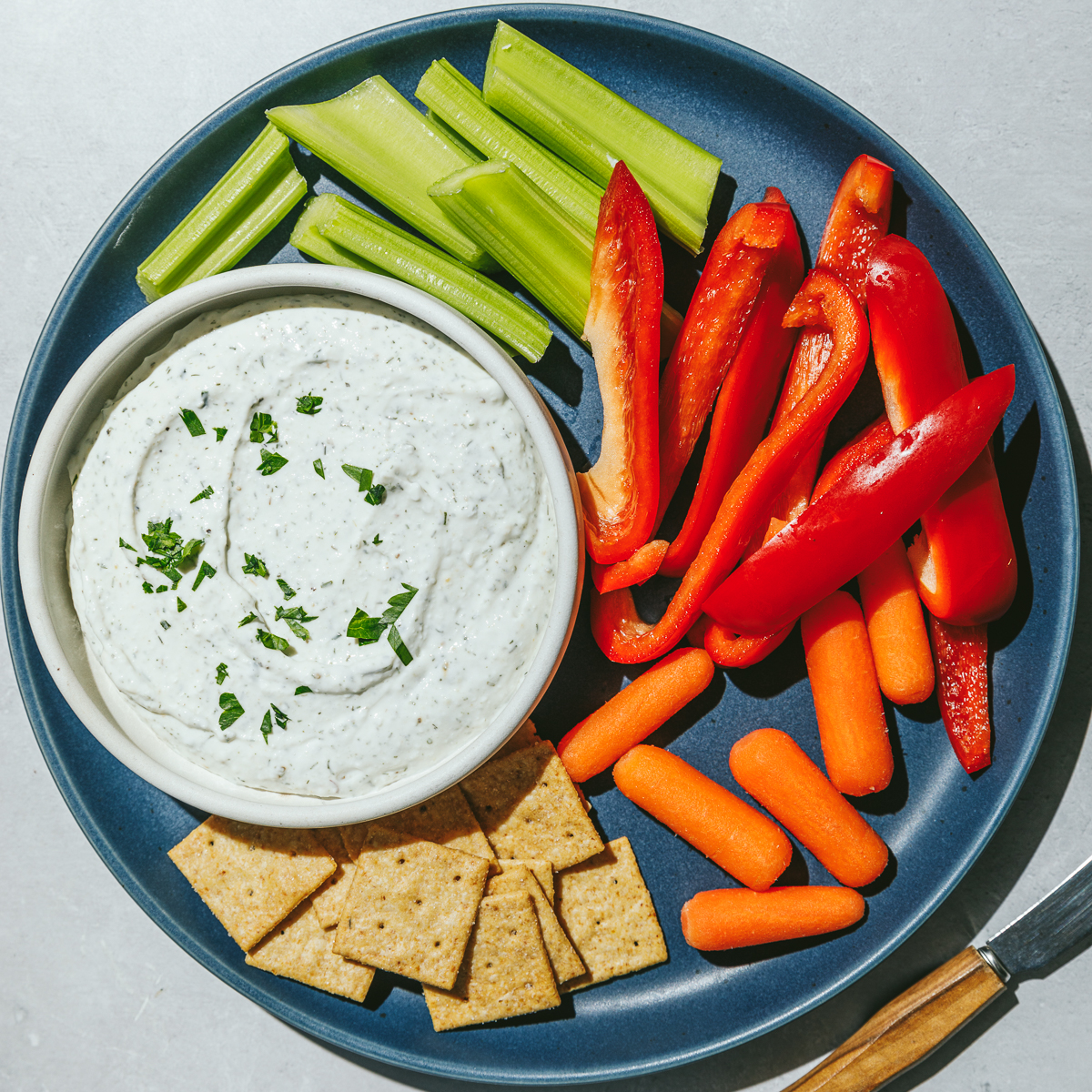 high protein ranch dip with peppers and crackers